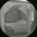 View of a 4-poster bed in a house interior