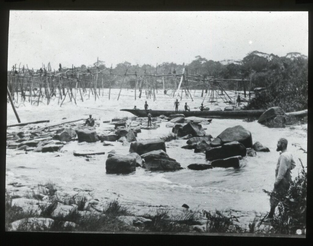 View of wooden frames over a rocky river