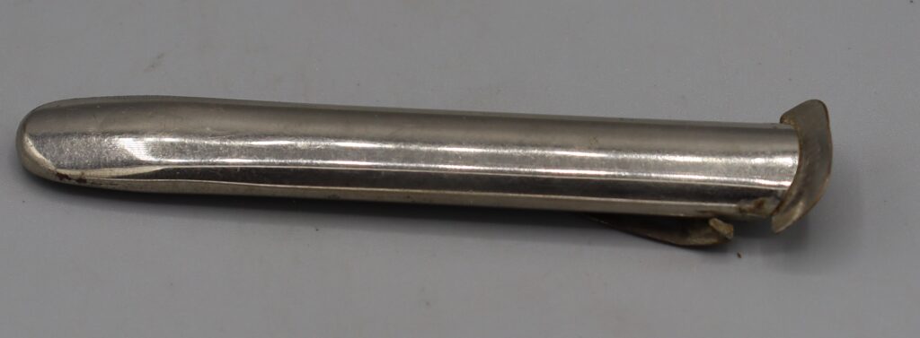 Silver metal buttonhole flower-holder, full view