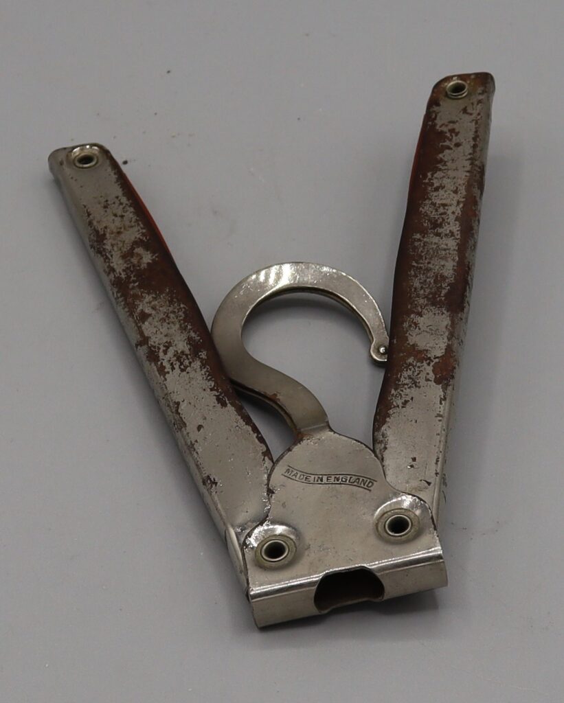 Folding clothes hanger, partially open