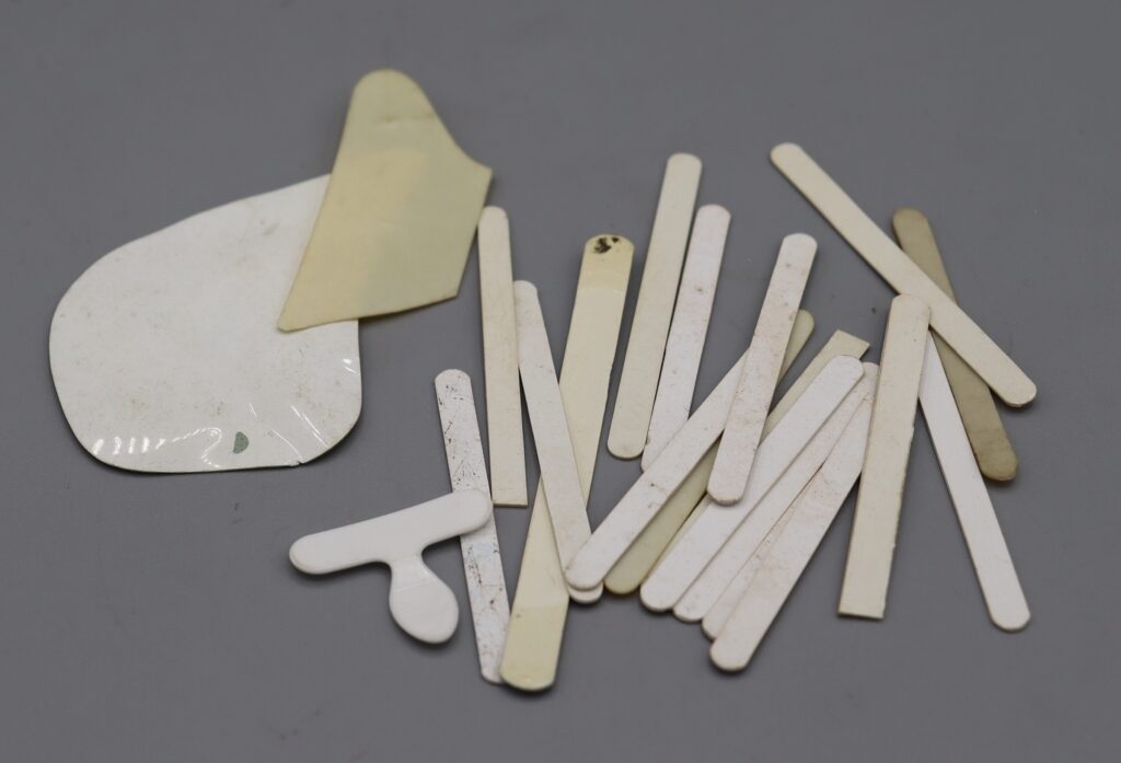 Assortment of collar stiffeners, straight and shaped