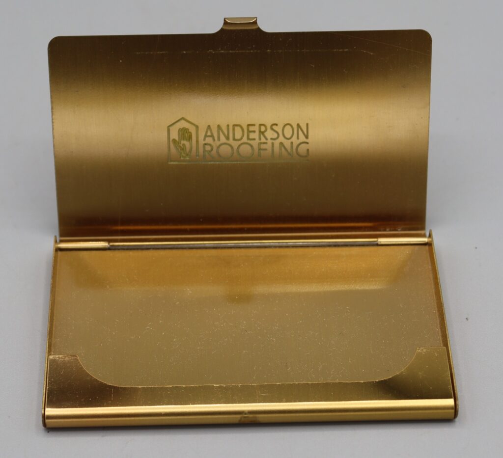 Case case, stamped Anderson Roofing, open view without contents