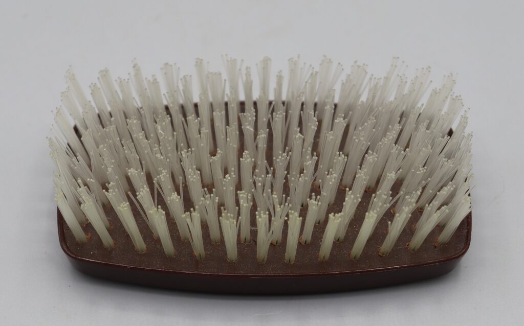 Man's hairbrush, bristle side upwards