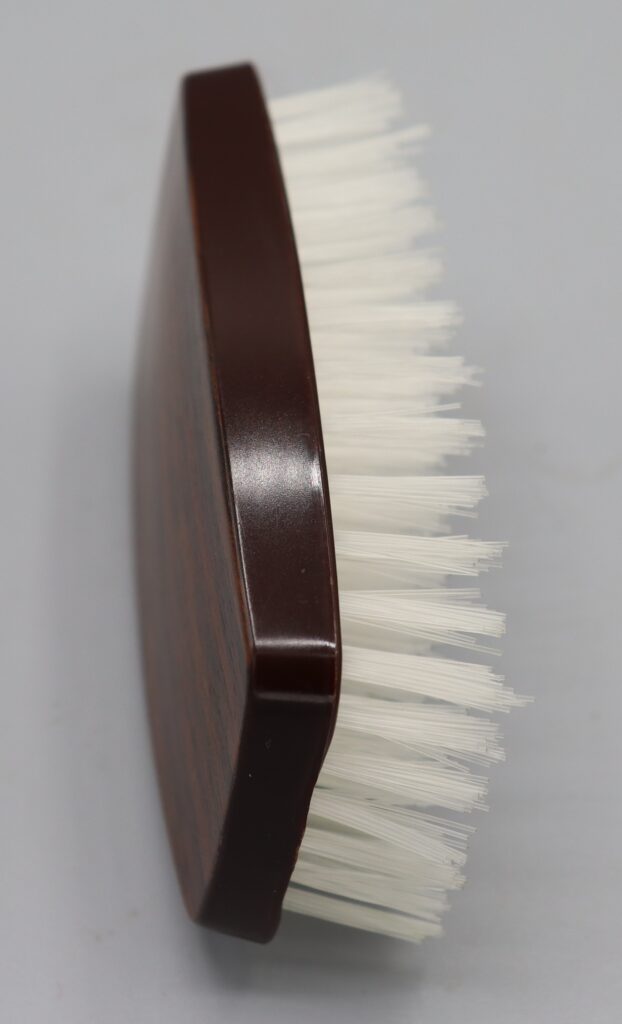 Man's hairbrush, side view