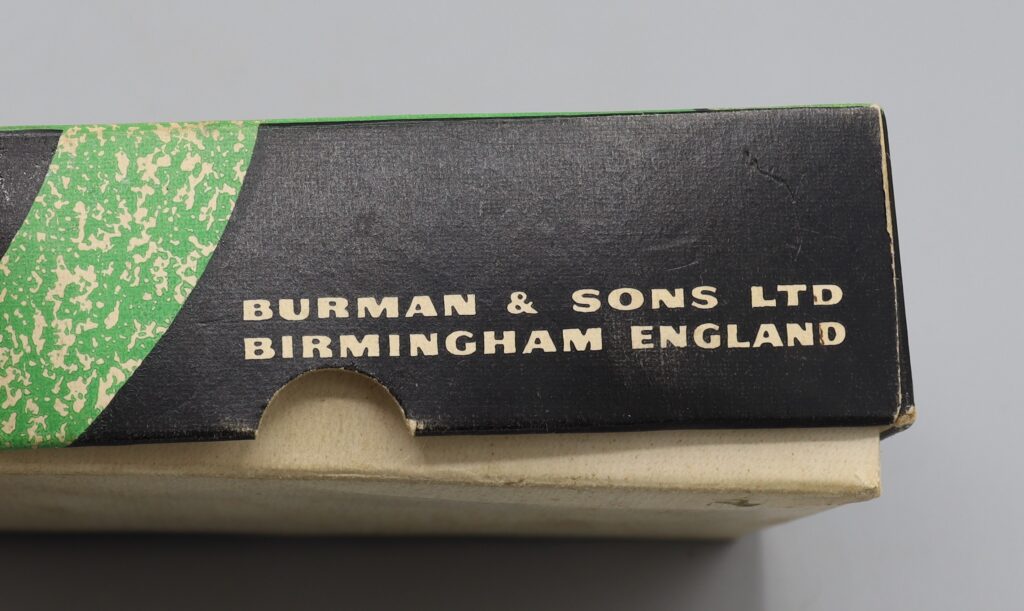 Side view of box for hairclippers showing manufacturer's name and location