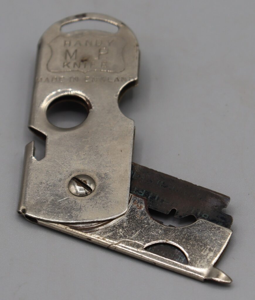 Folding knife shown partially open