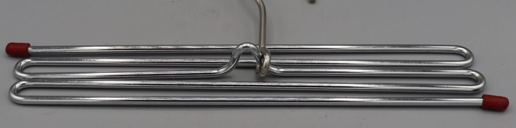 Metal tie hanger, close up view