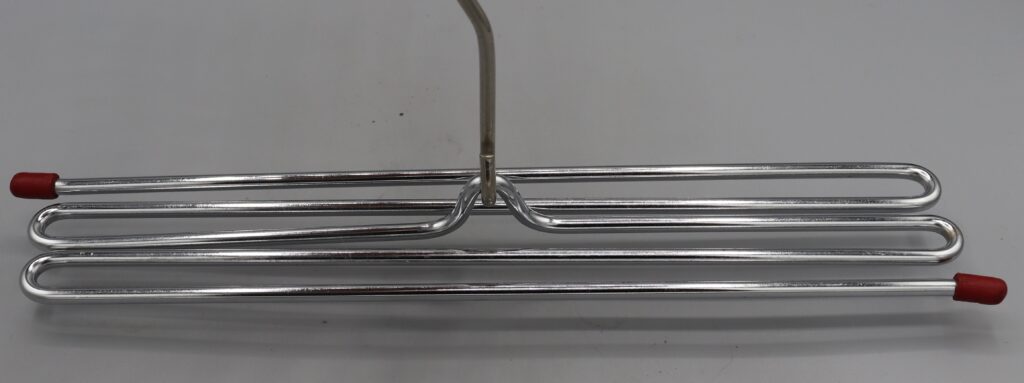 Metal tie hanger, close up view