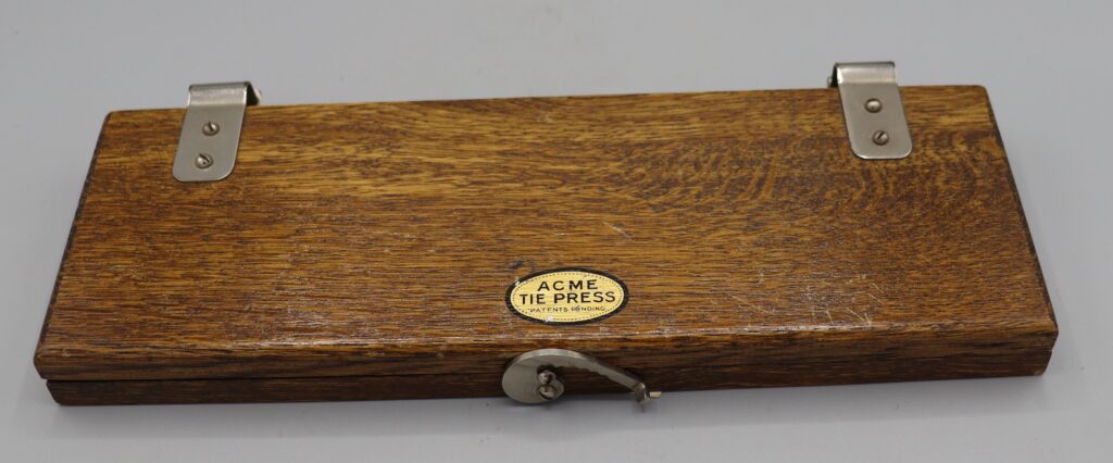 Wooden tie press by Acme