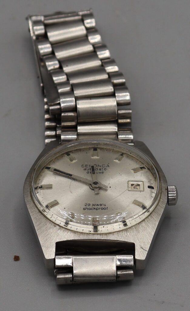 Man's wrist watch, stainless steel case and wristband