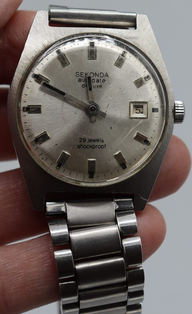 Man's wrist watch, stainless steel case