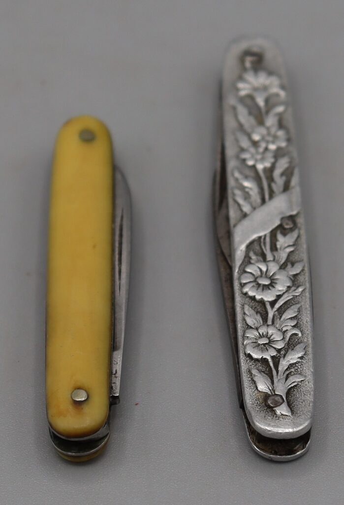 Two small penknives, shown folded