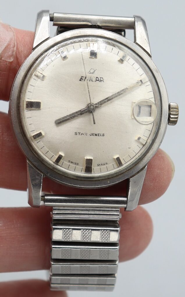 Man's wristwatch, close up of face