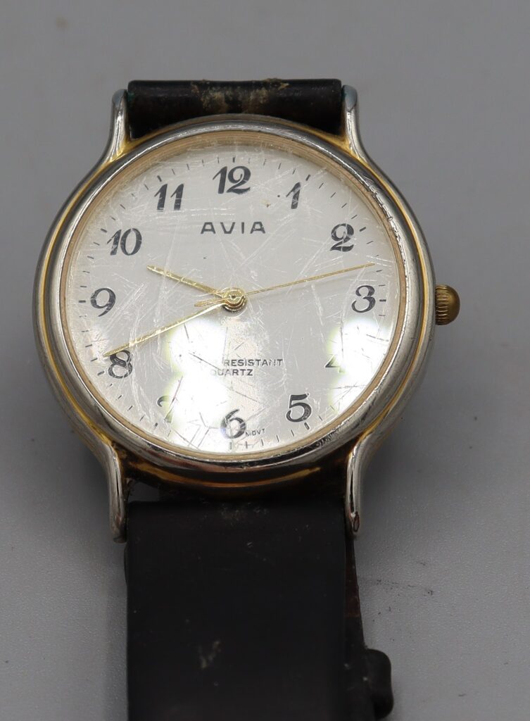 Man's wristwatch, close up of face