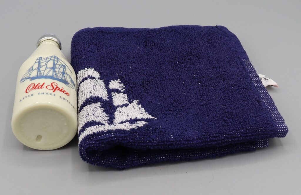 Old Spice aftershave bottle and facecloth