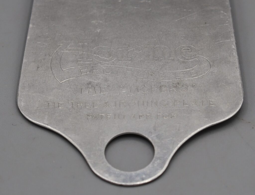 Back view of the tie ironing plate