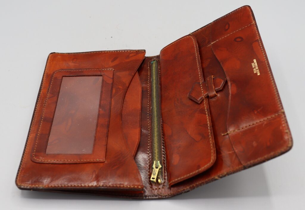 Leather wallet shown fully open