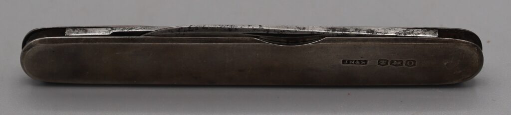 Silver penknife, side view
