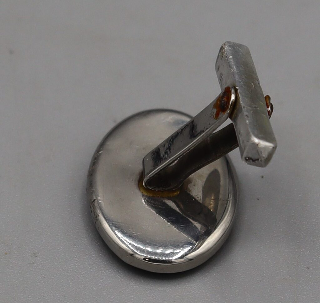 Single cufflink, back view
