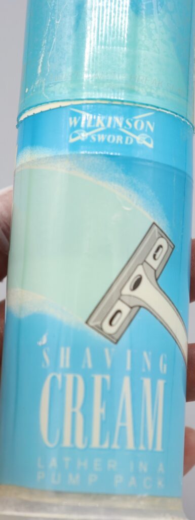 Shaving cream cannister, close-up of front