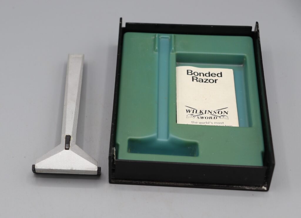 Top side (silver) of Wilkinson Sword razor &open box