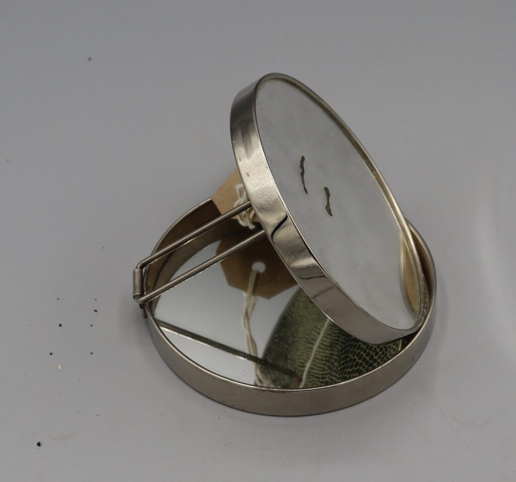 Travelling shaving mirror open