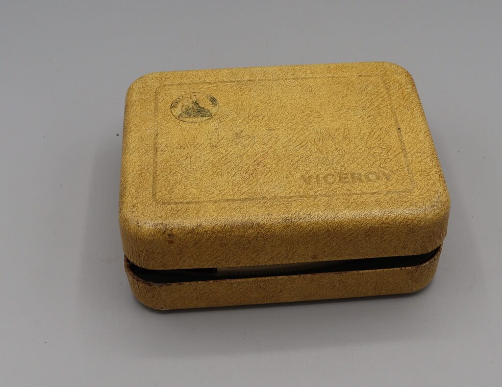 Electric Rolls razor in closed case