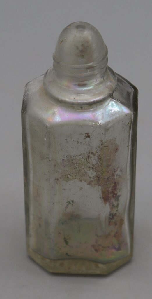 empty glass bottle which contained bath salts