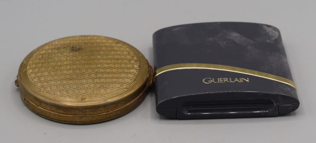two powder compacts