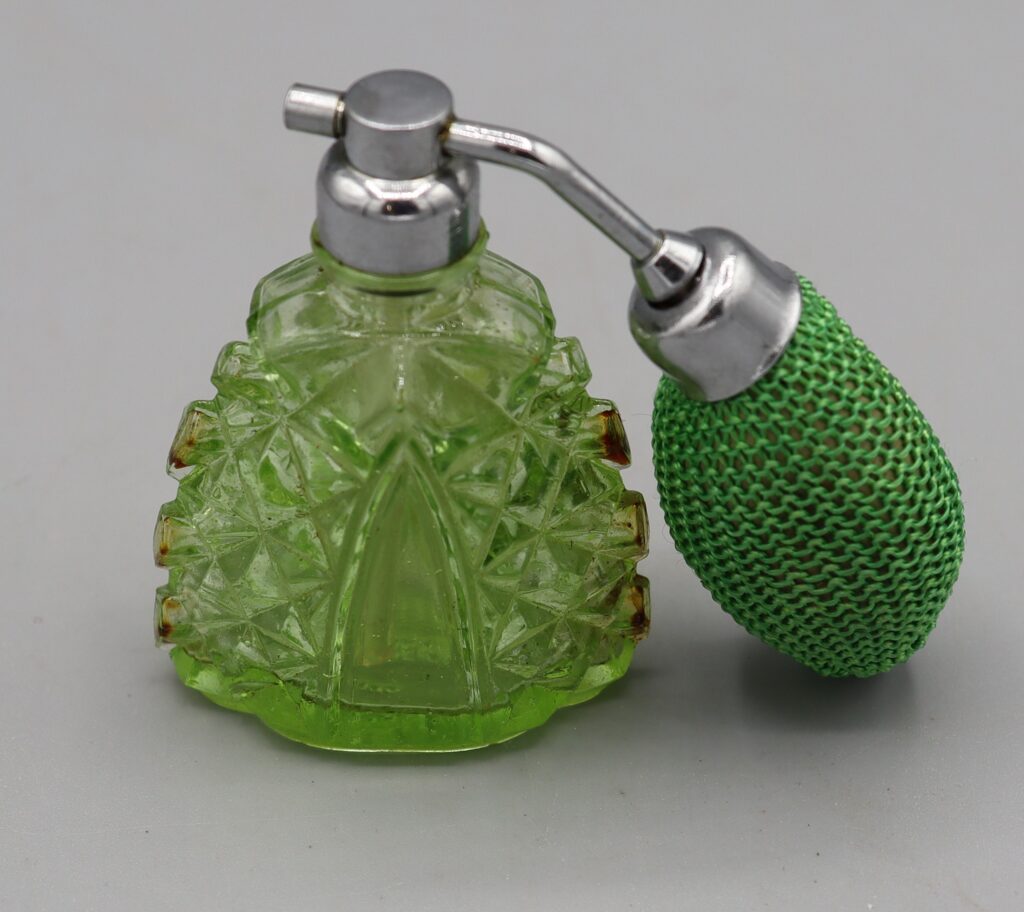 green perfume bottle