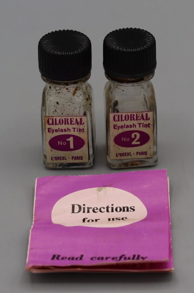 two small bottles of eyelash tint