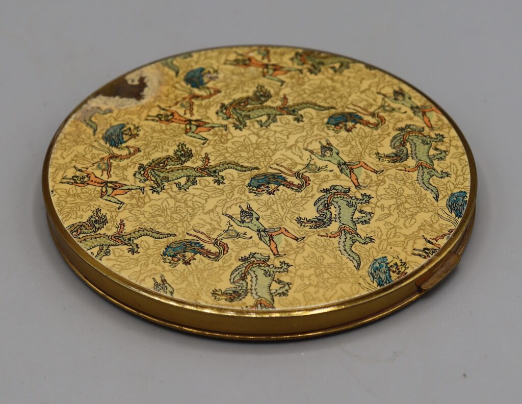 powder compact decorated with Persian dragons