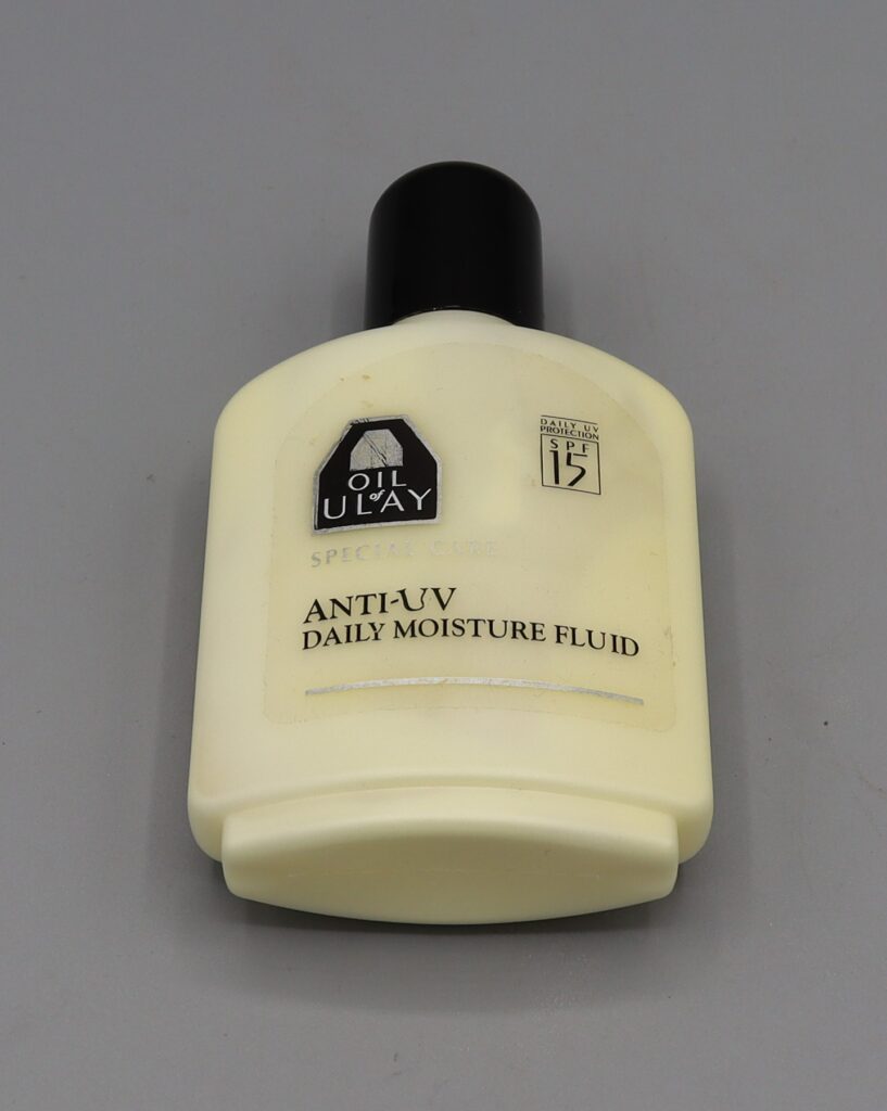 plastic bottle with moisturising fluid