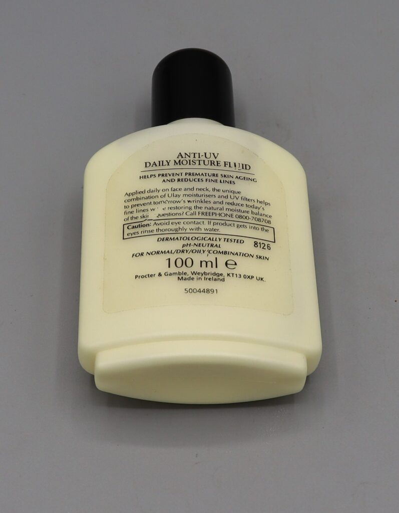 plastic bottle of moisturising fluid