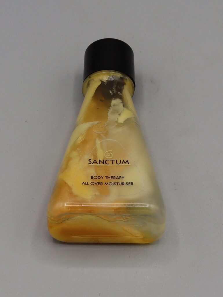 triangular plastic bottle with moisturiser