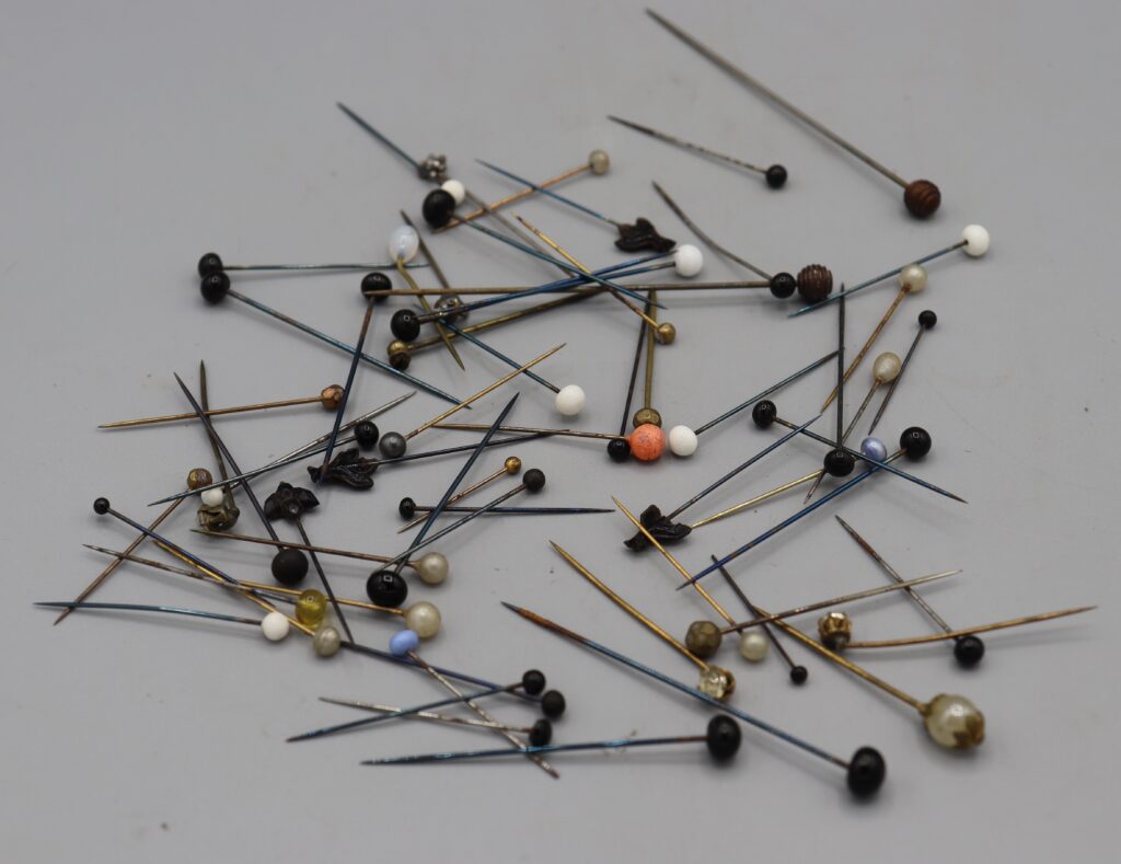 Hat pins and assorted boxed pins